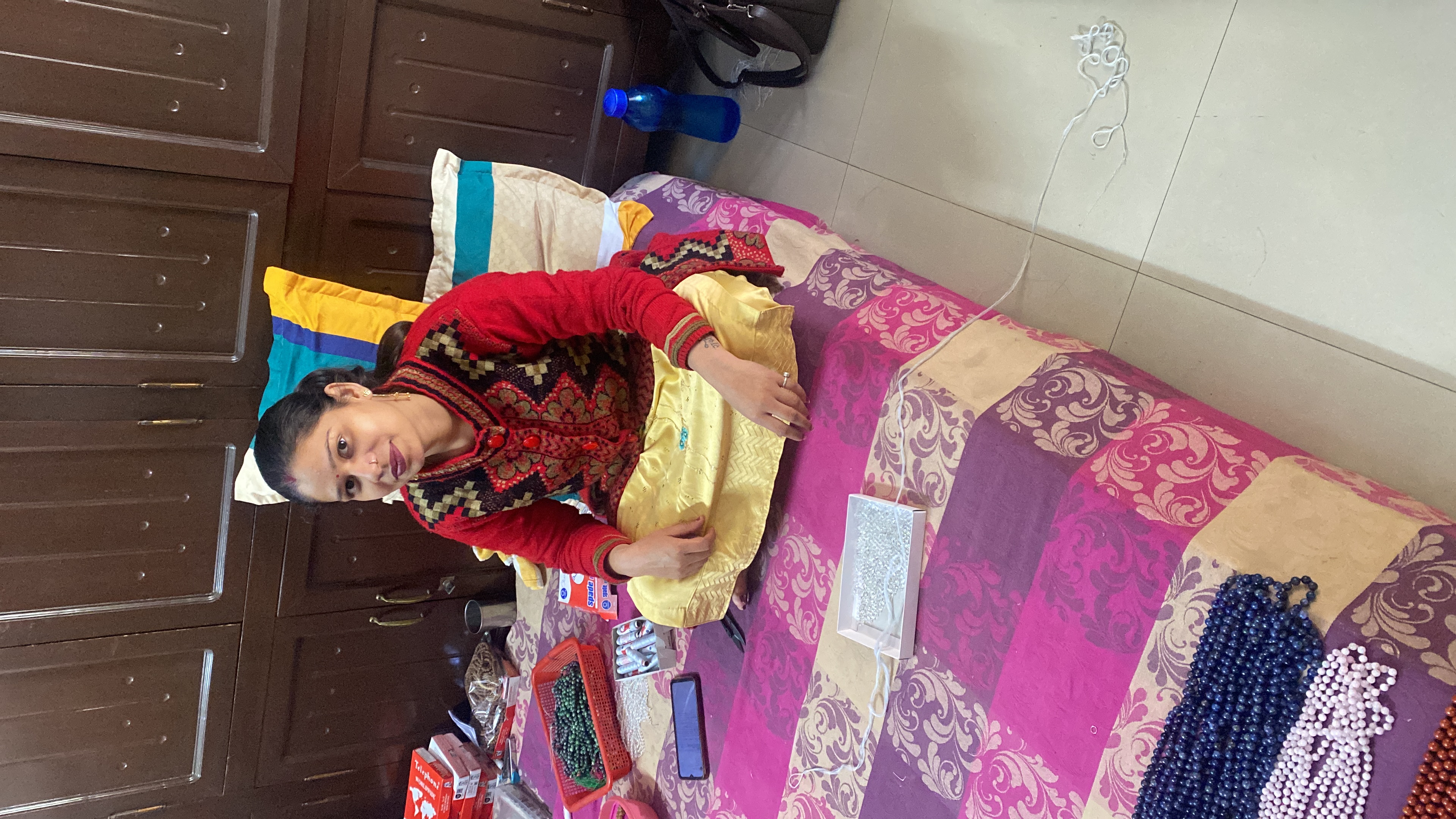 Original photograph of a Yantrakart artisan in her working space