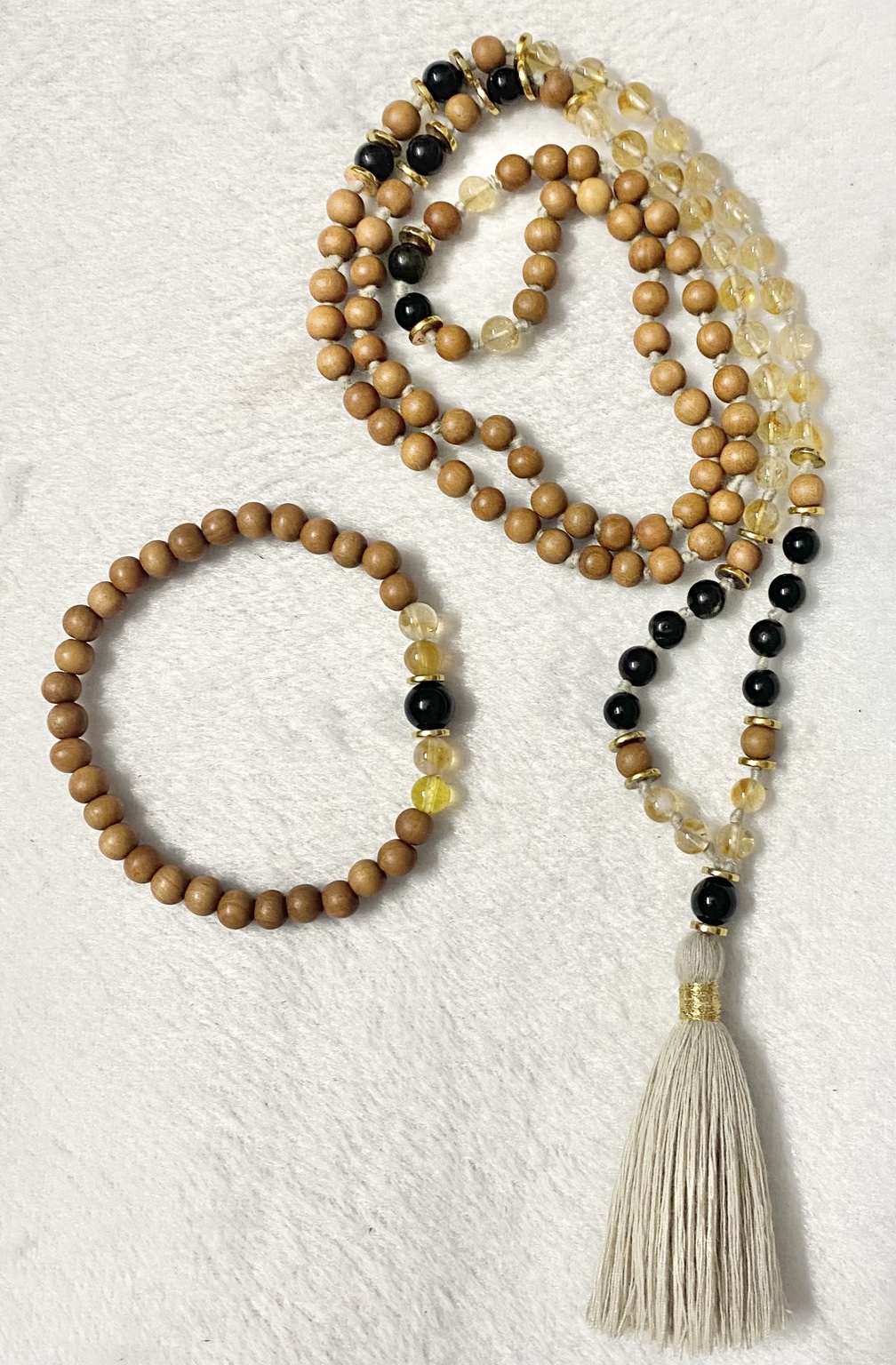 Original warm-toned Yantrakart mala and coordinating bracelet